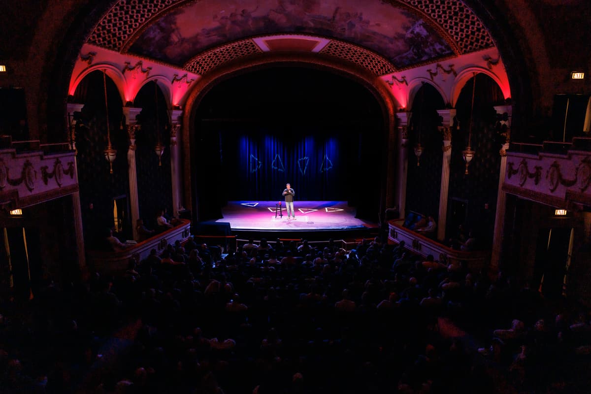 Theater performance with red lighting